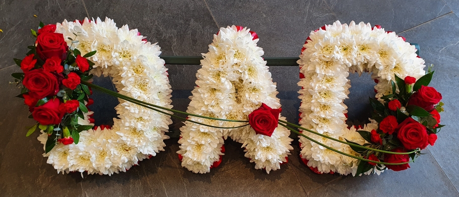White based chrysanthemum dad letter funeral tribute with flower spray and blue ribbon edge