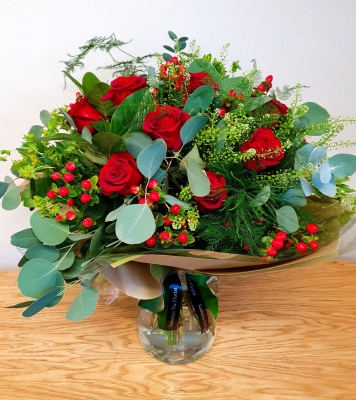 one dozen large red rose flower and mixed foliage handtied bouquet 