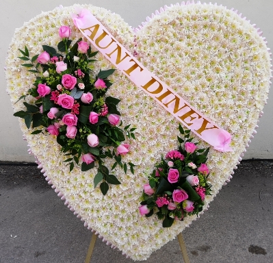 extra large white and pink flower heart shaped funeral tribute with rose spray