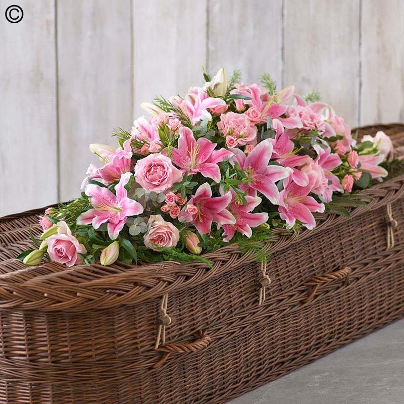lily and rose flower and foliage coffin spray