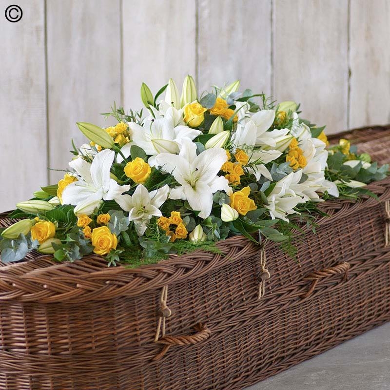 lily and rose flower and foliage coffin spray