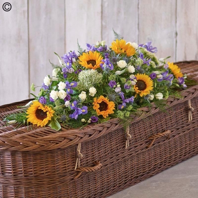 Sunflower and blue flower and foliage coffin spray