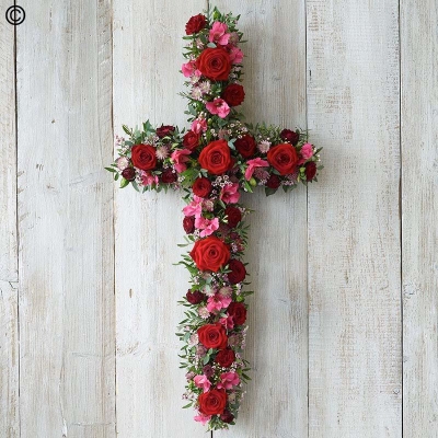red and pink cross flower and foliage funeral tribute