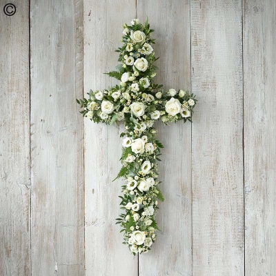 white and green flower and foliage cross funeral tribute