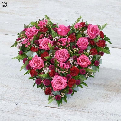 cerise rose, flower and foliage heart shaped funeral tribute