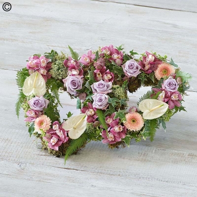 pastel flower and foliage double heart funeral tribute