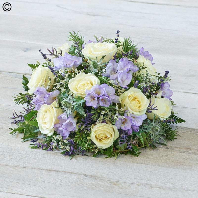 rose and freesia flower and foliage funeral tribute posy