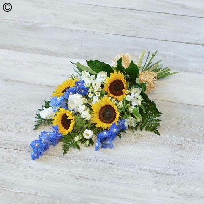 yellow sunflower and blue flower funeral sheaf