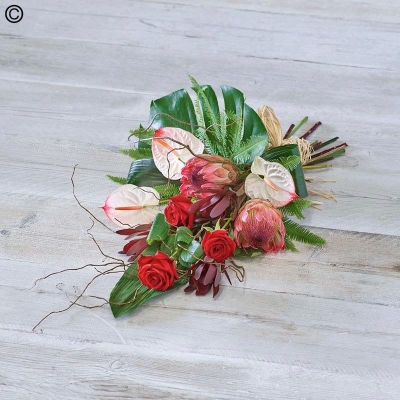 tropical flower and foliage funeral sheaf