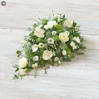 white mixed flower and foliage singled ended funeral coffin spray