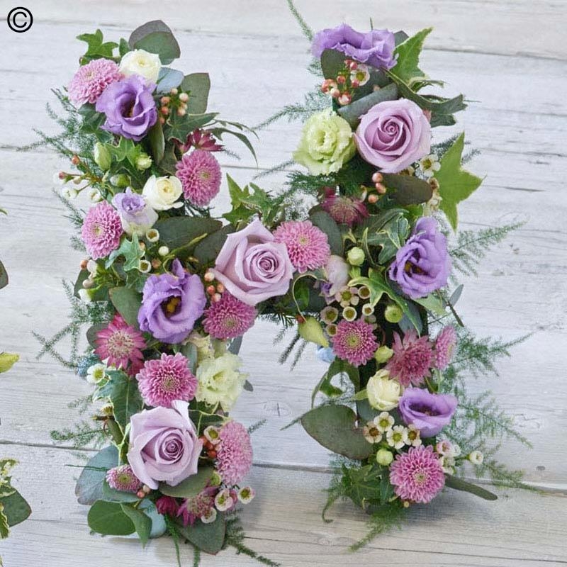 mixed flower and foliage funeral tribute letters