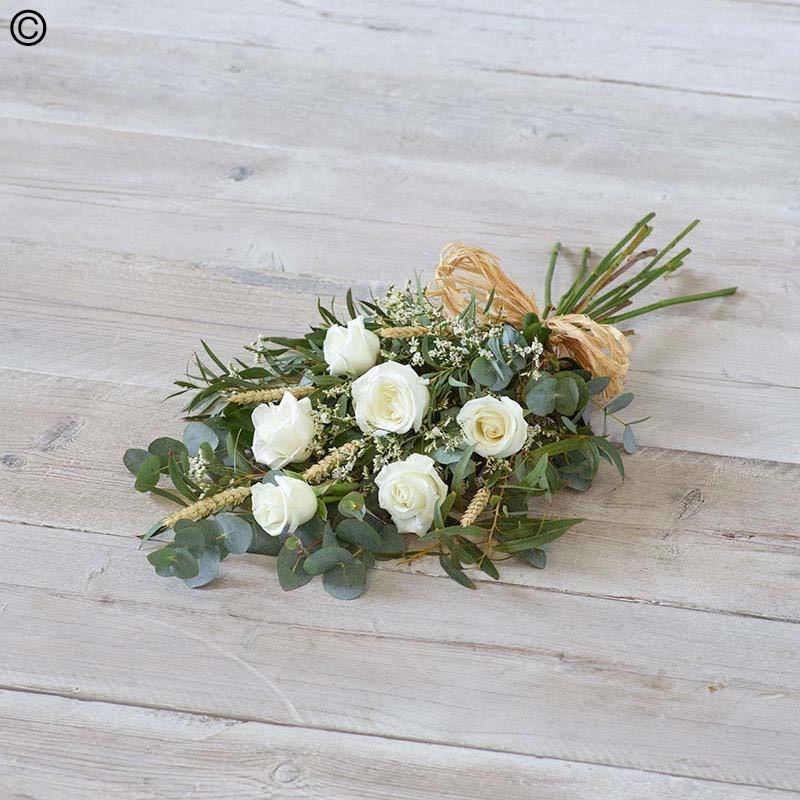rose flower and foliage funeral sheaf