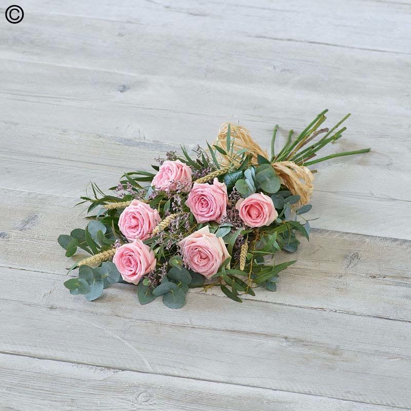 rose flower and foliage funeral sheaf