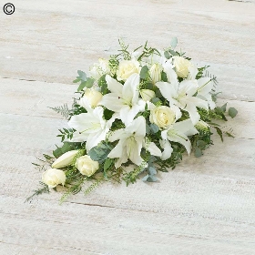 rose and lily flower and foliage single ended funeral coffin spray
