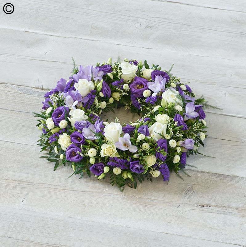 scented flower and foliage mixed funeral tribute wreath