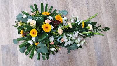 Autumnal flower and foliage single ended funeral coffin spray 