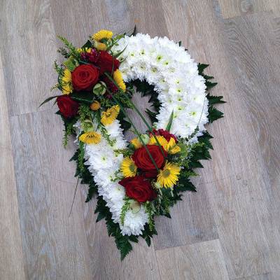White chrysanthemum with flower and foliage spray chaplet funeral tribute