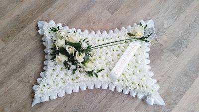 White chrysanthemum based pillow funeral flower tribute with ribbon 