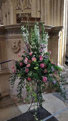 Large modern pink and lilac funeral flower pedestal