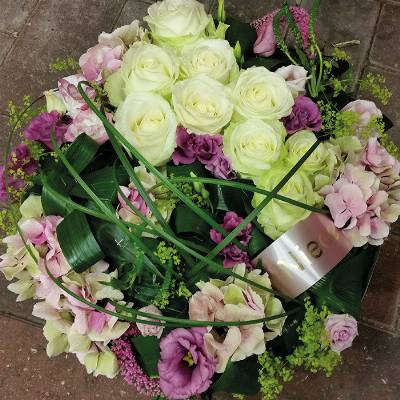 White and pink contemporary rose and hydrandea flower and foliage posy funeral tribute
