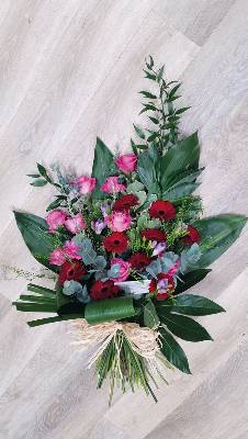 Red and pink flower and foliage funeral tribute 
