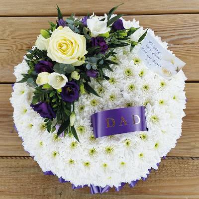 Based white chrysanthemum and purple flower funeral tribute posy with coloured ribbon