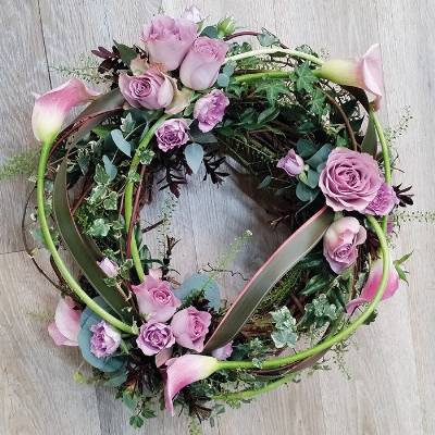 Willow and lilac rose flower and foliage funeral tribute wreath 
