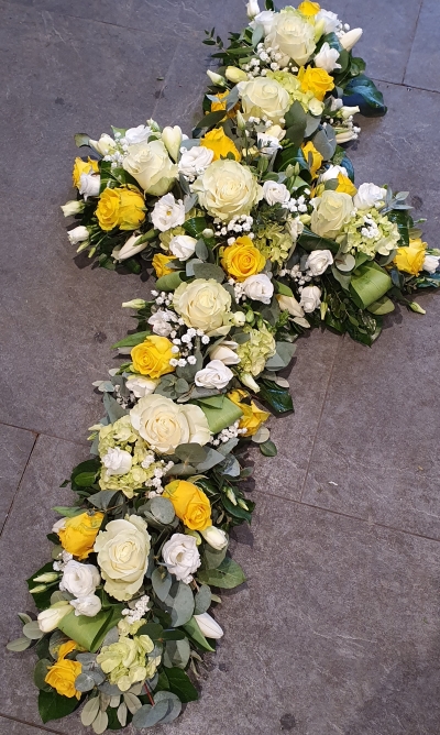 Yellow and White Loose Cross