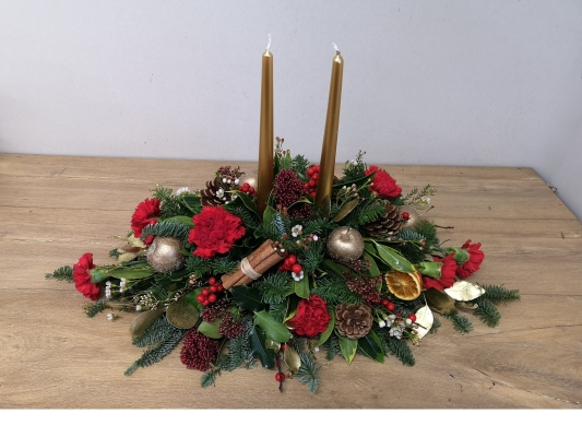 festive flower and foliage arrangement table centrepiece