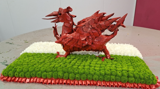 3d white, green and red welsh dragon flag flower funeral tribute