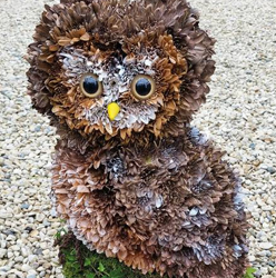 3d owl flower and foliage realistic funeral tribute