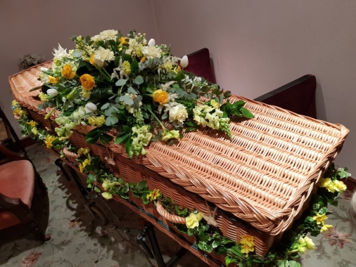 A pretty spring garland of rustic Ivy with selection of narcissus for a natural look.