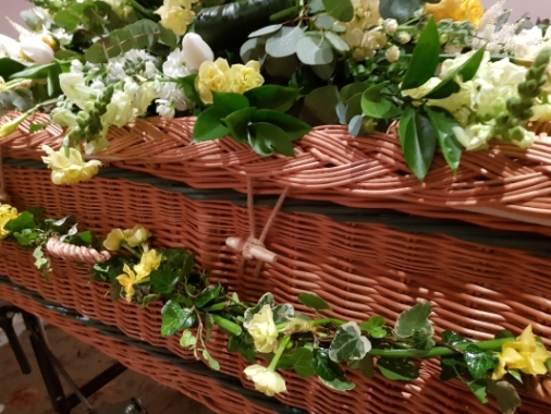 A pretty spring garland of rustic Ivy with selection of narcissus for a natural look.