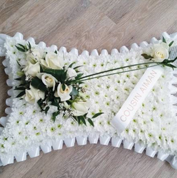 White chrysanthemum based pillow funeral flower tribute with ribbon 