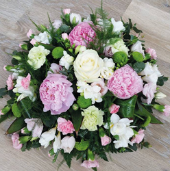 Pink peony and white scented funeral tribute flower and foliage posy