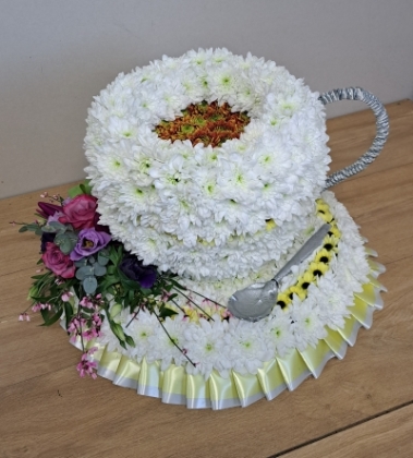 teacup and saucer flower aand foliage bespoke funeral tribute