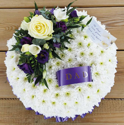 Based white chrysanthemum and purple flower funeral tribute posy with coloured ribbon